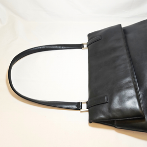 CHANEL Shoulder Black Leather Bag with Embossed CHANEL Logo