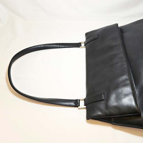 Load image into Gallery viewer, CHANEL Shoulder Black Leather Bag with Embossed CHANEL Logo
