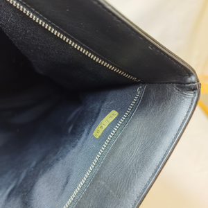 CHANEL Shoulder Black Leather Bag with Embossed CHANEL Logo