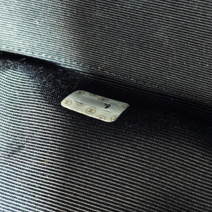 CHANEL Shoulder Black Leather Bag with Embossed CHANEL Logo