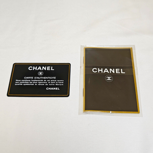 CHANEL Shoulder Black Leather Bag with Embossed CHANEL Logo