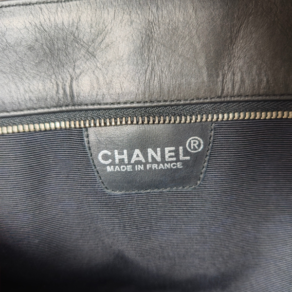 Load image into Gallery viewer, CHANEL Shoulder Black Leather Bag with Embossed CHANEL Logo
