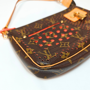 LOUIS VUITTON Perforated Pochette Accessories Monogram Canvas Fuchsia M95185