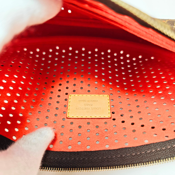 Load image into Gallery viewer, LOUIS VUITTON Perforated Pochette Accessories Monogram Canvas Fuchsia M95185

