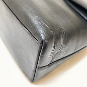 CHANEL Shoulder Black Leather Bag with Embossed CHANEL Logo